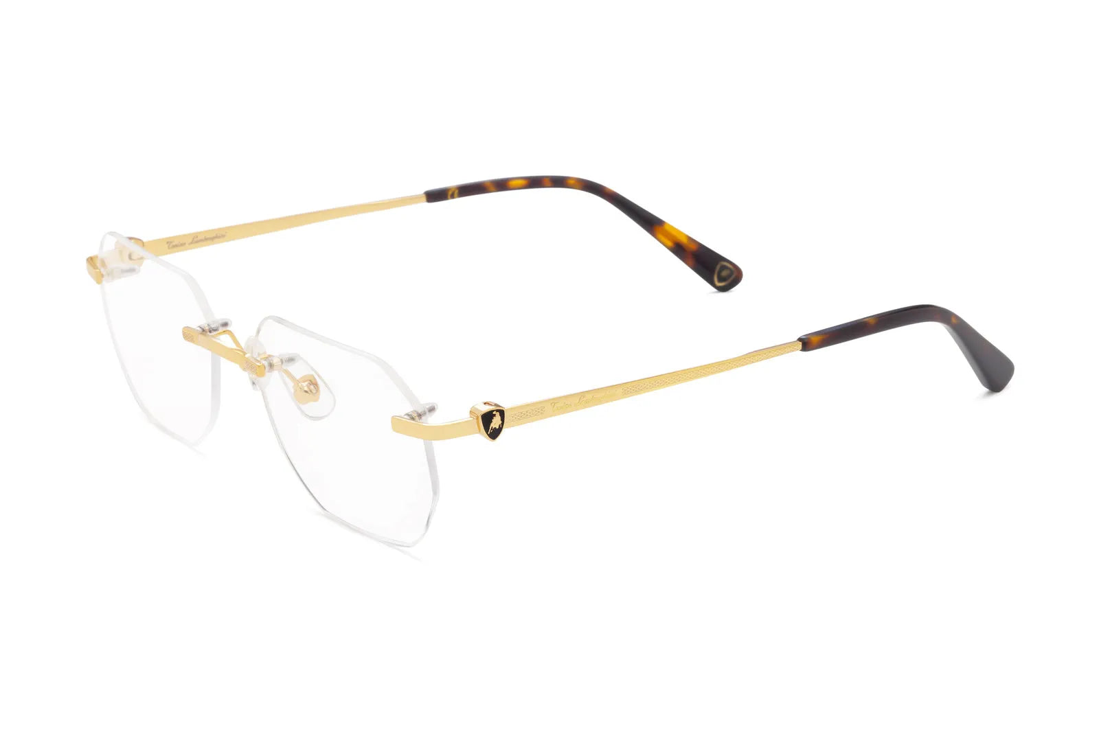 Occhiale Tonino Lamborghini TLX 701 Colore 01 Oro. Eleva il tuo sguardo con gli occhiali da vista Tonino Lamborghini. Design ergonomico e materiali nobili per un comfort senza pari. Spedizione gratuita.