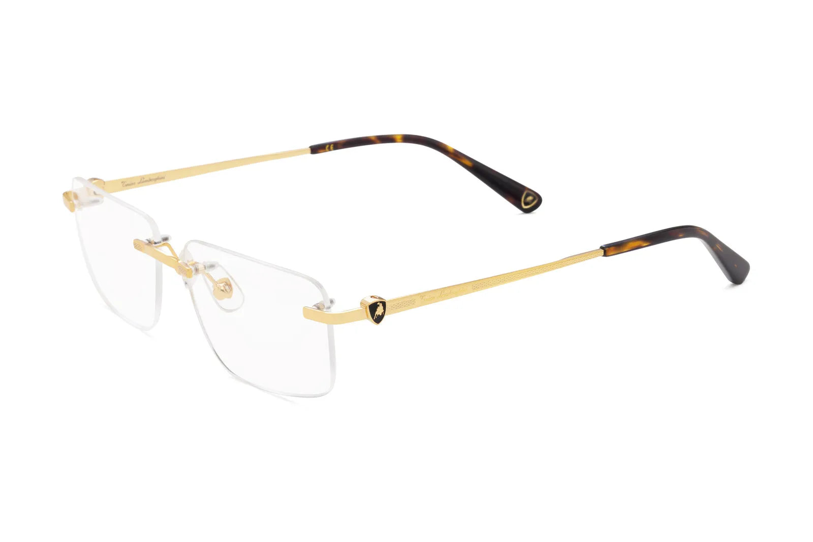 Occhiale Tonino Lamborghini TLX 702 Colore 01 Oro. Eleva il tuo sguardo con gli occhiali da vista Tonino Lamborghini. Design ergonomico e materiali nobili per un comfort senza pari. Spedizione gratuita.