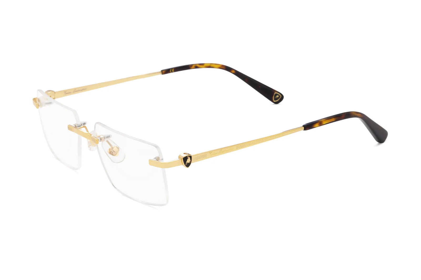 Occhiale Tonino Lamborghini TLX 703 Colore 01 Oro. Eleva il tuo sguardo con gli occhiali da vista Tonino Lamborghini. Design ergonomico e materiali nobili per un comfort senza pari. Spedizione gratuita.