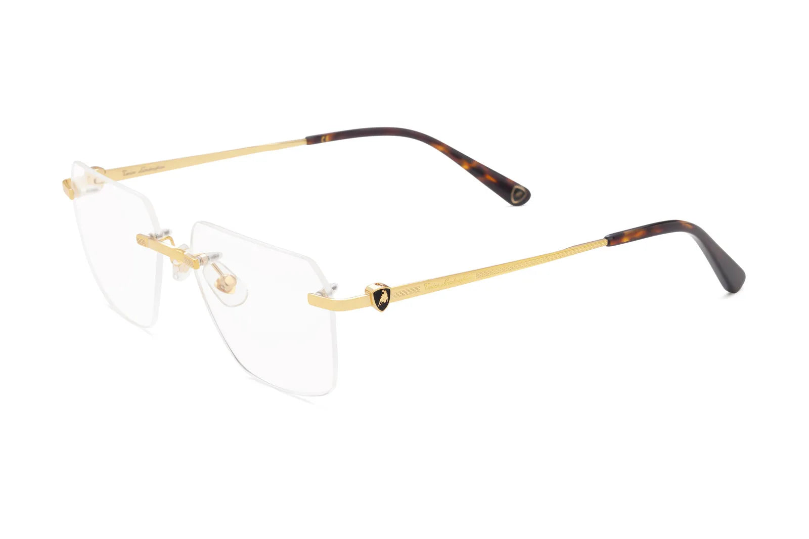 Occhiale Tonino Lamborghini TLX 704 Colore 02 Oro. Eleva il tuo sguardo con gli occhiali da vista Tonino Lamborghini. Design ergonomico e materiali nobili per un comfort senza pari. Spedizione gratuita.