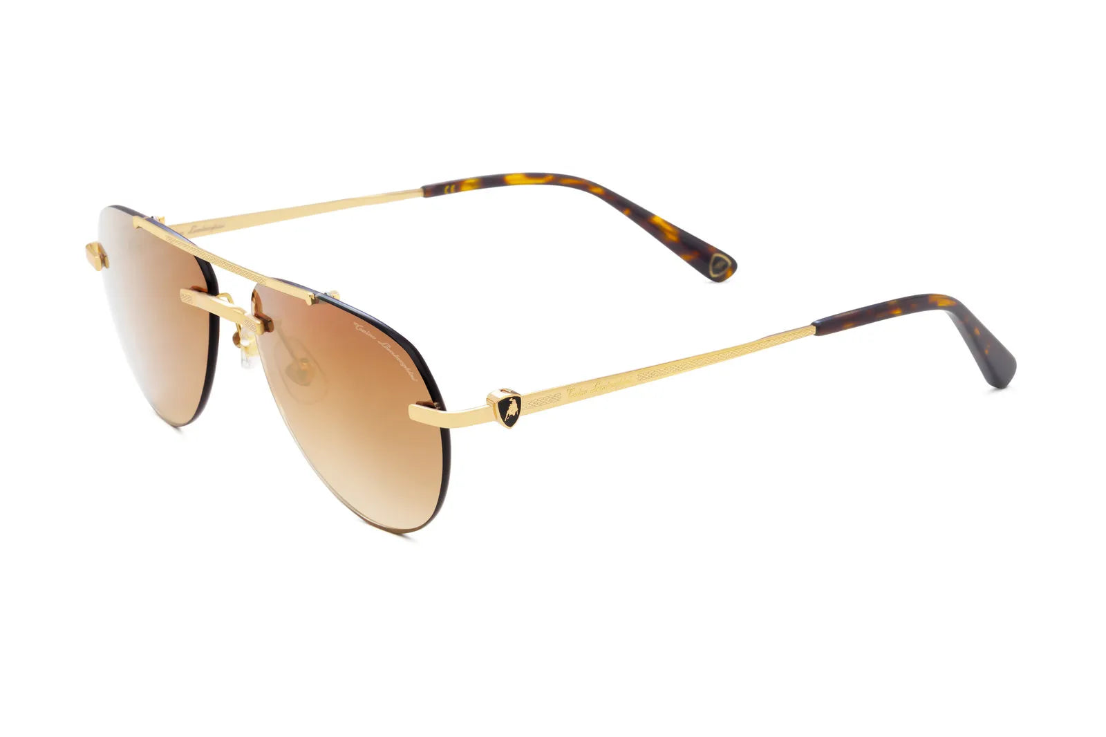 Occhiale Tonino Lamborghini TLX 200 Colore 01 Oro. Scopri la collezione di occhiali da sole Tonino Lamborghini. Lenti premium e materiali pregiati per uno stile audace che non accetta compromessi.